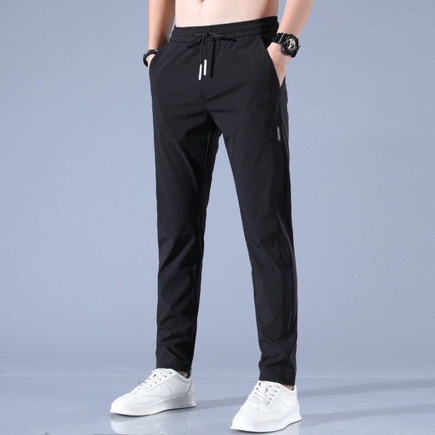 Pantalones casuales de seda de hielo para hombre, versión coreana, tendencia de moda grande, pantalones de pierna recta elásticos y transpirables