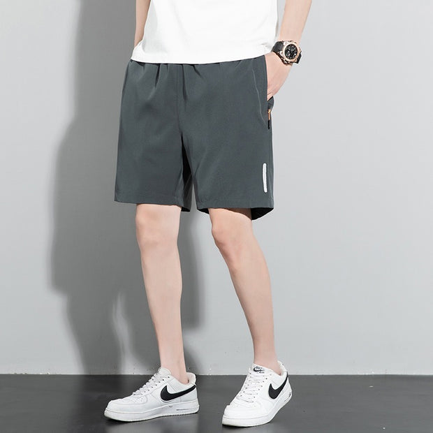 Pantalones cortos para hombre, nuevos pantalones de un solo cuarto, de color liso, rectos, de secado rápido, de seda helada, versión coreana, pantalones de playa grandes