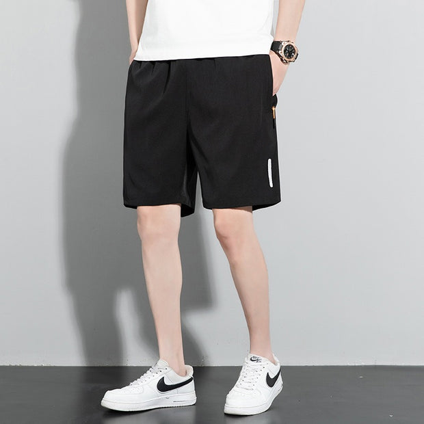 Pantalones cortos para hombre, nuevos pantalones de un solo cuarto, de color liso, rectos, de secado rápido, de seda helada, versión coreana, pantalones de playa grandes